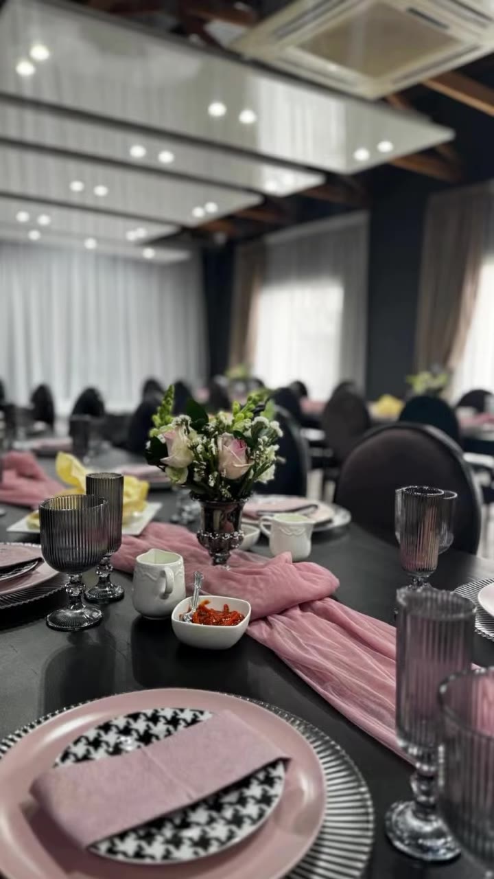 Blush pink and black table setting